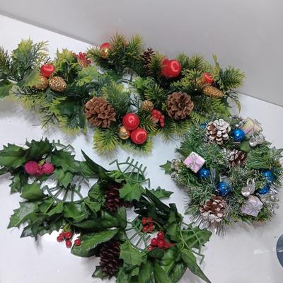 Vintage plastic greenery Christmas pinecones and presents