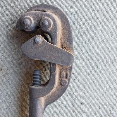 Vintage tools - leather punch - wood handled drills - and vintage pipe cutter