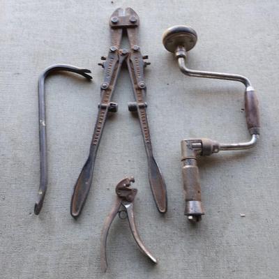 Crowbar - bolt cutters- and a vintage drill with wooden handle