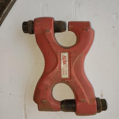Large sized pipe wrench and a riveting tool