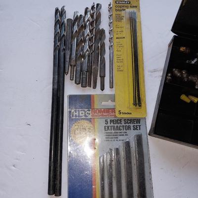 Assortment of drill bits and valves for tires