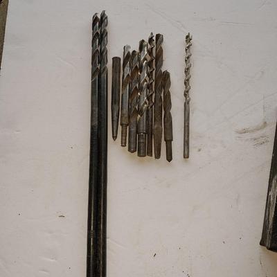 Assortment of drill bits and valves for tires