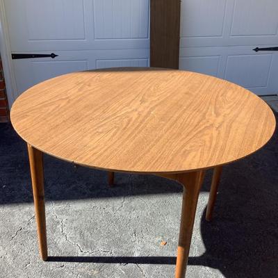 Wooden round table with vinyl top 30"H 41"diameter 10.5" leaf