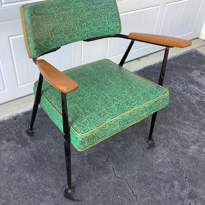 Green Mid-Century design padded chair with wooden arms, metal legs 29"H 25"W 19"seat depth