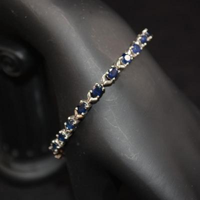 925 Sterling Tennis Bracelet w/ Topaz 7" 12.4g