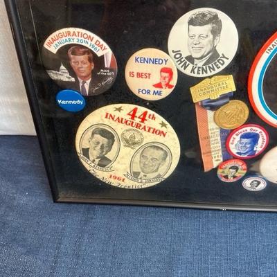 Lot 45, John F. Kennedy inauguration day buttons, 18 1/2â€œ x 11 1/2â€œ