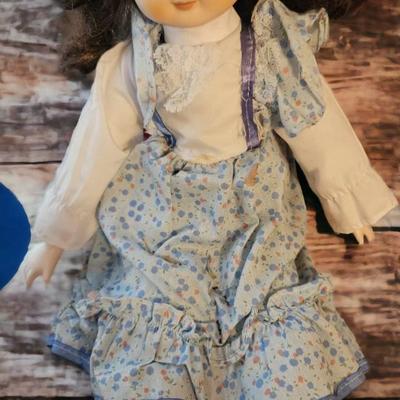 Doll dressed in blue