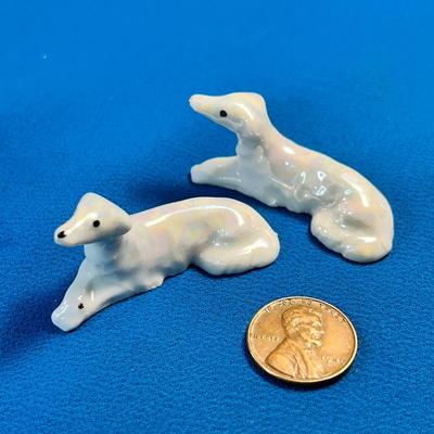 PAIR OF PORCELAIN RECLINING DOG FIGURINES  MADE IN JAPAN