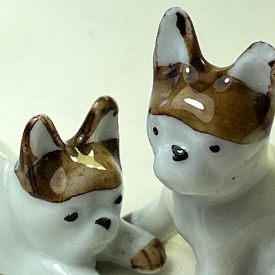 PAIR OF LITTLE PORCELAIN DOG FIGURES
