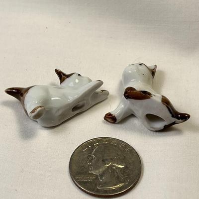 PAIR OF LITTLE PORCELAIN DOG FIGURES