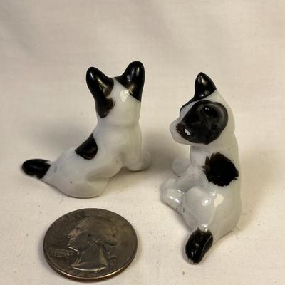 PAIR OF BLACK AND WHITE CERAMIC DOG FIGURES MADE IN JAPAN
