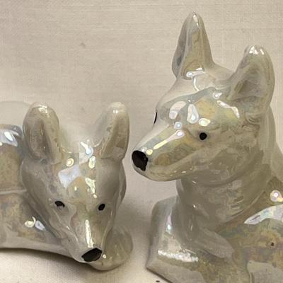 PAIR OF RECLINING DOG FIGURES w/ PEARLESCENT GLAZED FINISH