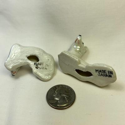 PAIR OF RECLINING DOG FIGURES w/ PEARLESCENT GLAZED FINISH