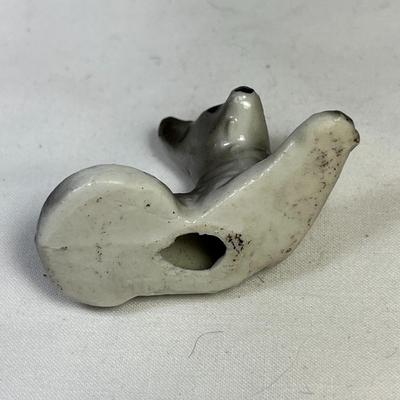 CERAMIC RECLINING SHEPHERD DOG FIGURINE