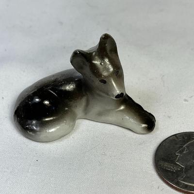 CERAMIC RECLINING SHEPHERD DOG FIGURINE