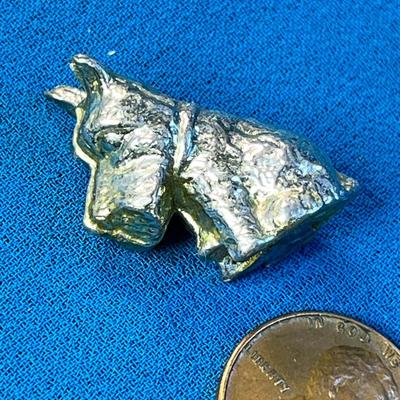 TINY METAL SITTING DOG FIGURINE
