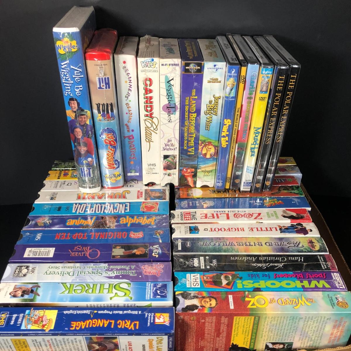 LOT 20L Packaged VHS Tapes & DVDs