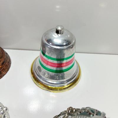 Vintage plastic bell ornaments with one green flocked bell