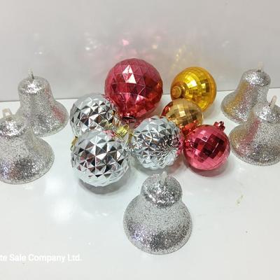 Variety of plastic Disco ball ornaments and plastic glittery bells