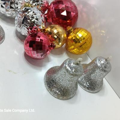 Variety of plastic Disco ball ornaments and plastic glittery bells