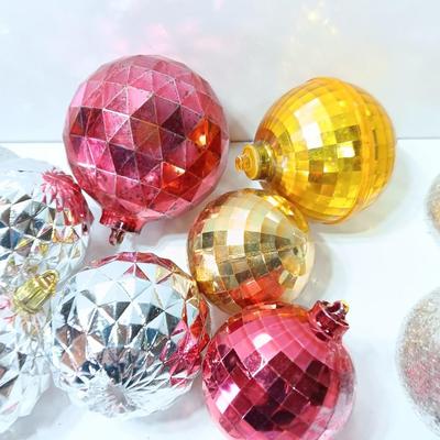 Variety of plastic Disco ball ornaments and plastic glittery bells