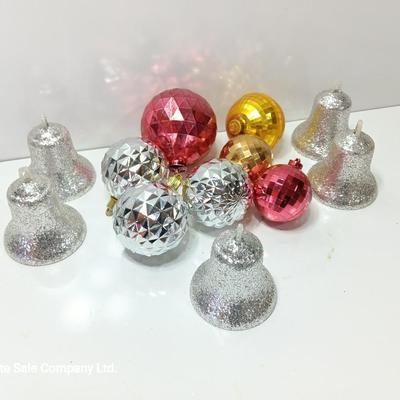 Variety of plastic Disco ball ornaments and plastic glittery bells