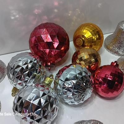 Variety of plastic Disco ball ornaments and plastic glittery bells