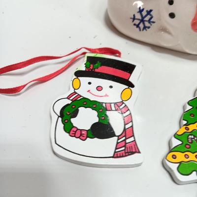 Snowman boot with three vintage wooden ornaments