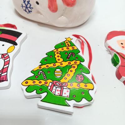Snowman boot with three vintage wooden ornaments