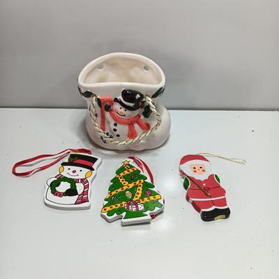 Snowman boot with three vintage wooden ornaments