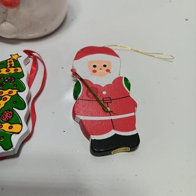 Snowman boot with three vintage wooden ornaments