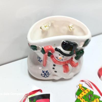 Snowman boot with three vintage wooden ornaments