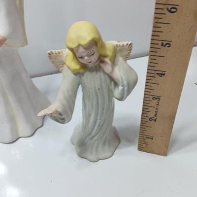 Three vintage ceramic angel figures