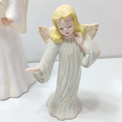 Three vintage ceramic angel figures