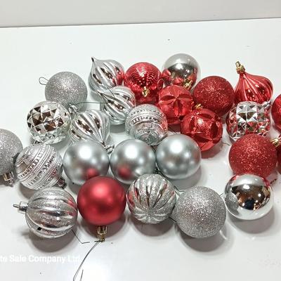 Red and silver colored plastic ornaments