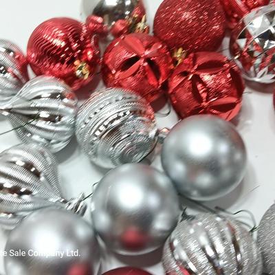 Red and silver colored plastic ornaments