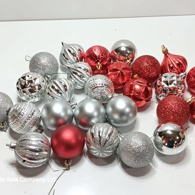 Red and silver colored plastic ornaments
