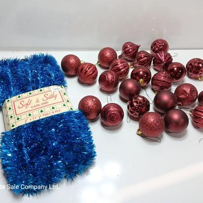 Maroon plastic ornaments with blue garland