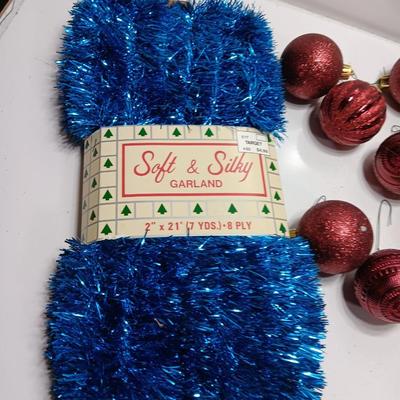 Maroon plastic ornaments with blue garland