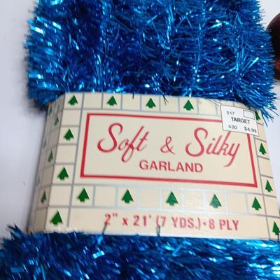 Maroon plastic ornaments with blue garland