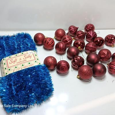 Maroon plastic ornaments with blue garland