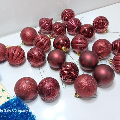 Maroon plastic ornaments with blue garland