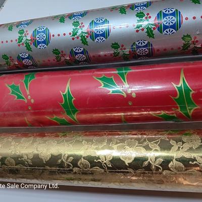 Three large rolls of vintage wrapping paper