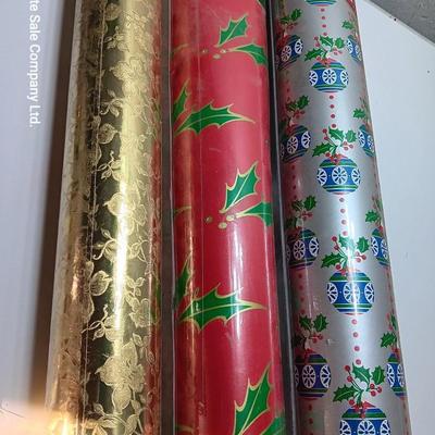 Three large rolls of vintage wrapping paper