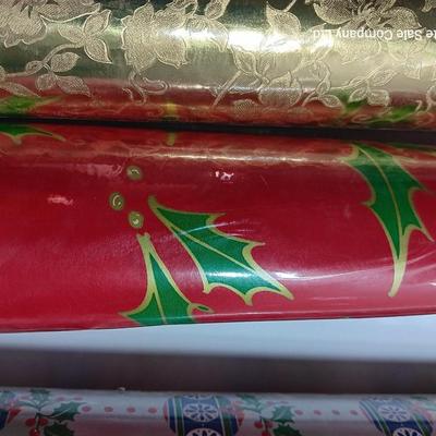 Three large rolls of vintage wrapping paper