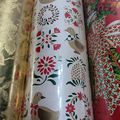 Three large rolls of vintage wrapping paper
