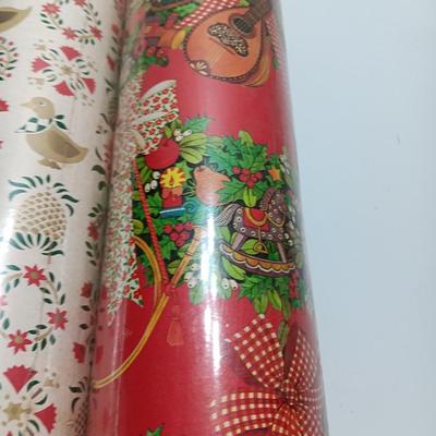 Three large rolls of vintage wrapping paper