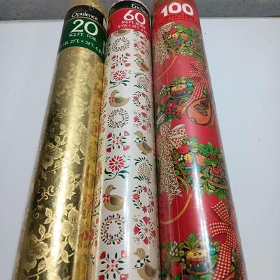 Three large rolls of vintage wrapping paper