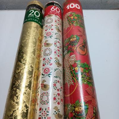 Three large rolls of vintage wrapping paper