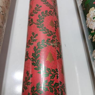 Three large rolls and one smaller roll of Vintage wrapping paper